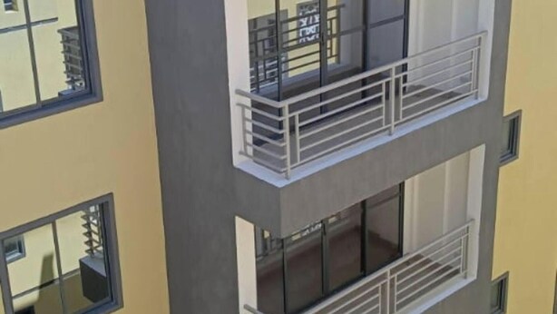 A multi-story building with balconies and windows. - Private Stylish Flat in Nyali Mombasa with Pool near Beach (Mombasa)