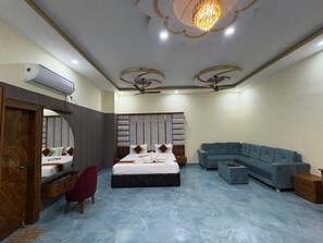 Luxury Suite | Living area | 52-inch LED TV with cable channels, Netflix, streaming services - HOTEL DIAMOND CREST (Patna)