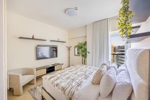 Klassiek appartement, balkon, uitzicht op het strand | Een strijkplank/strijkijzer, gratis wifi