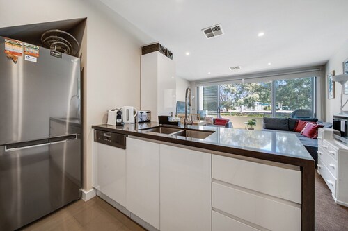 Tranquil Apartment in Green, Well Connected Suburb