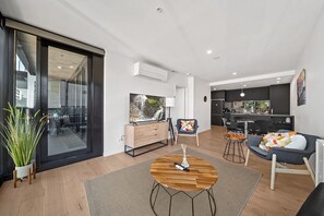 Living area - Bright Unit with Secure Parking and Garden Access (Reid)