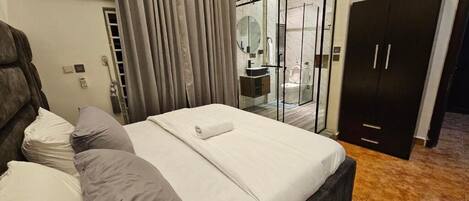 Desk, laptop workspace, blackout curtains, soundproofing