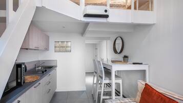 Fridge, microwave, stovetop, coffee/tea maker