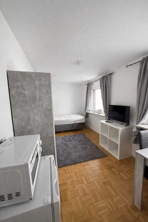 Comfort Apartment, City View | Iron/ironing board, free WiFi