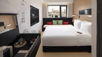 Habitación individual Confort, vistas a la ciudad | Caja fuerte, cortinas opacas, sistema de insonorización