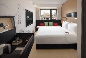 Habitación individual Confort, vistas a la ciudad | Caja fuerte, cortinas opacas, sistema de insonorización