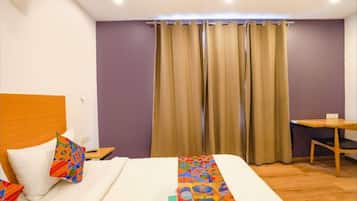 Deluxe Single Room, City View | Desk, laptop workspace, free WiFi