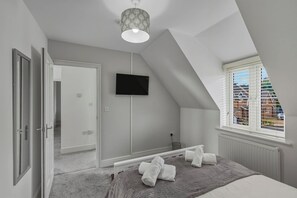 Een strijkplank/strijkijzer, gratis wifi, beddengoed