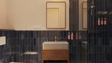 Habitación doble | Baño | Regadera, amenidades de baño gratuitas, secadora de cabello, toallas