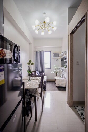 Beautiful 2-bedroom condo with AC in soothing Muntinlupa