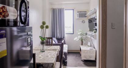 Beautiful 2-bedroom condo with AC in soothing Muntinlupa