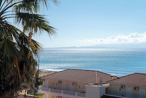 Superior Triple Room | In-room safe, desk, laptop workspace, blackout drapes