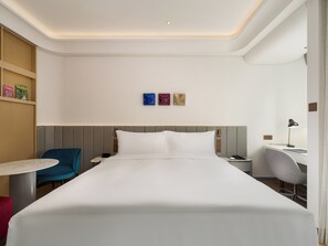 Coffres-forts dans les chambres, fer et planche à repasser