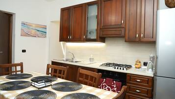 Standard Apartment, Balcony, Beach View | Private kitchen