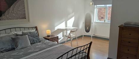 1 bedroom, desk, iron/ironing board, travel cot