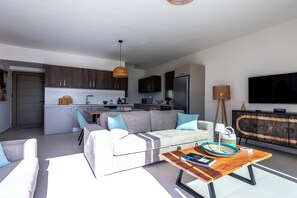 A modern apartment with a living room, kitchen, and dining area. - Elpida Luxury Villa, Private Pool, Fantastic View (Chania)