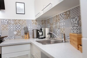 Deluxe Duplex, 1 Bedroom, Kitchen, Canal View | Private kitchen | Full-sized fridge, microwave, stovetop, dishwasher - CABANA - Oldenburg City Center (Oldenburg)