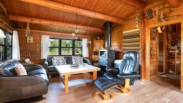 Hytte - 2 soveværelser - sauna - udsigt til have | Opholdsområde | Bøger