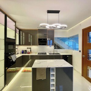 Superior Apartment, Balcony, City View | Private kitchen | Fridge, microwave, oven, stovetop - Phaluxe Shortlets (Abuja)