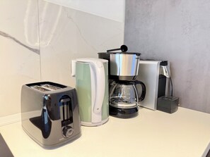 Kaffee und/oder Kaffeemaschine
