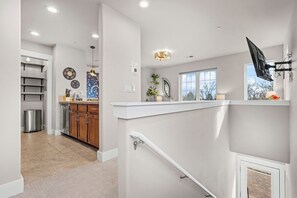 Studio Suite, 1 Queen Bed with Sofa bed, Balcony, Garden View (233 Urban Prairie St. Unit B) | Interior - The Revive Loft Balcony, Workspace & Bikes (Fort Collins)