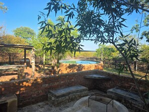 Superior Chalet, Garden View | Garden view - Klipdrift Sands Game Lodge (Hammanskraal)