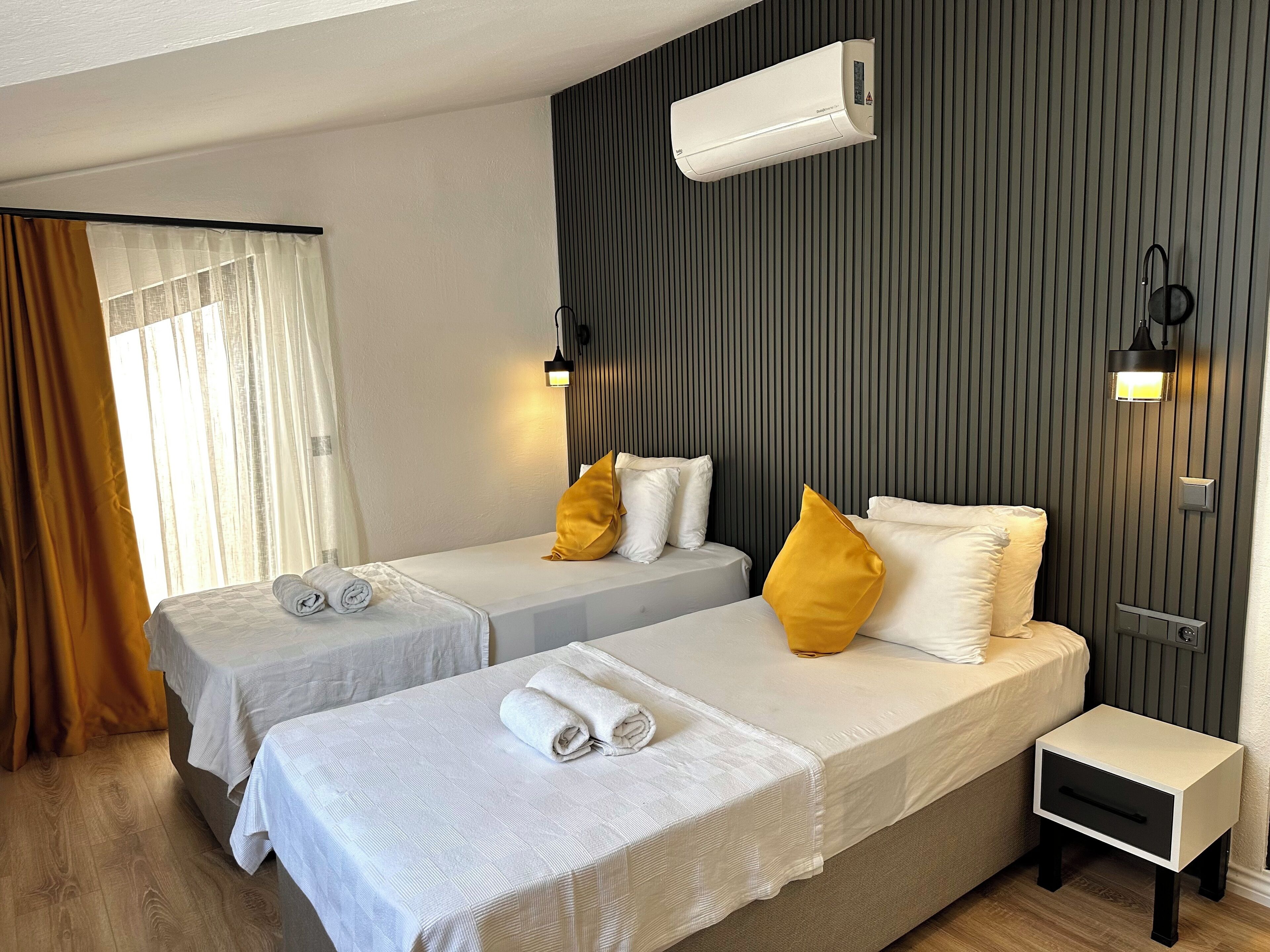 Habitación económica, 2 camas individuales | Wifi gratis 