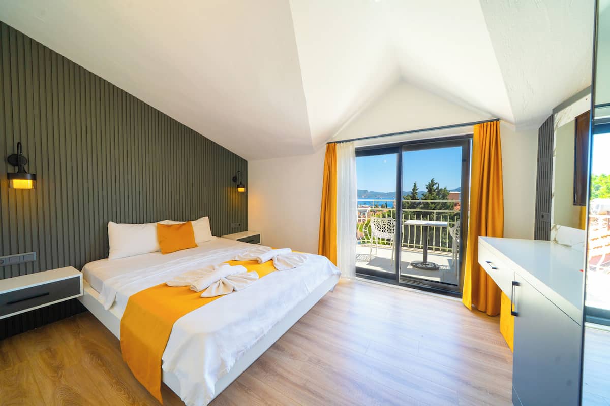 Habitación Deluxe, balcón, vista al mar | Wifi gratis y ropa de cama