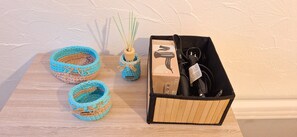 Hair dryer, towels, soap, toilet paper