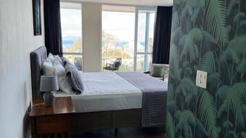 Deluxe Suite, Balcony, Sea View | Iron/ironing board (on request), free WiFi