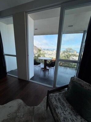 Suite Supérieure, balcon, vue mer | Coin séjour