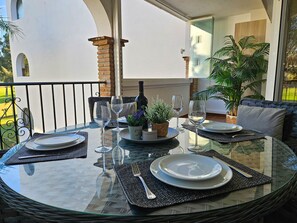 Outdoor dining - Two bedroom golf side apartment, Mijas Golf (Mijas Costa)