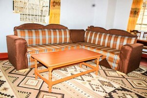 Family Bungalow | Living area | 32-inch Smart TV with digital channels