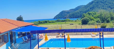 Family Room, Multiple Beds, Balcony, Sea View | Premium bedding, free WiFi, bed sheets
