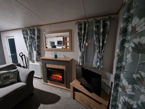 Fernseher, Kamin