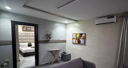 Cozy 2-bedroom apartment in peaceful Asaba with AC