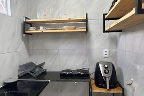 Apartment (01) | Private kitchen | Fridge, blender, cookware/dishes/utensils, cleaning supplies