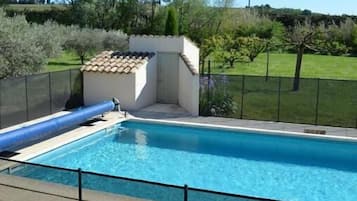 Seasonal outdoor pool, open 9:00 AM to 8:00 PM, pool loungers