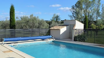 Seasonal outdoor pool, open 9:00 AM to 8:00 PM, pool loungers