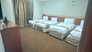 Deluxe Quadruple Room | Minibar, free WiFi, bed sheets