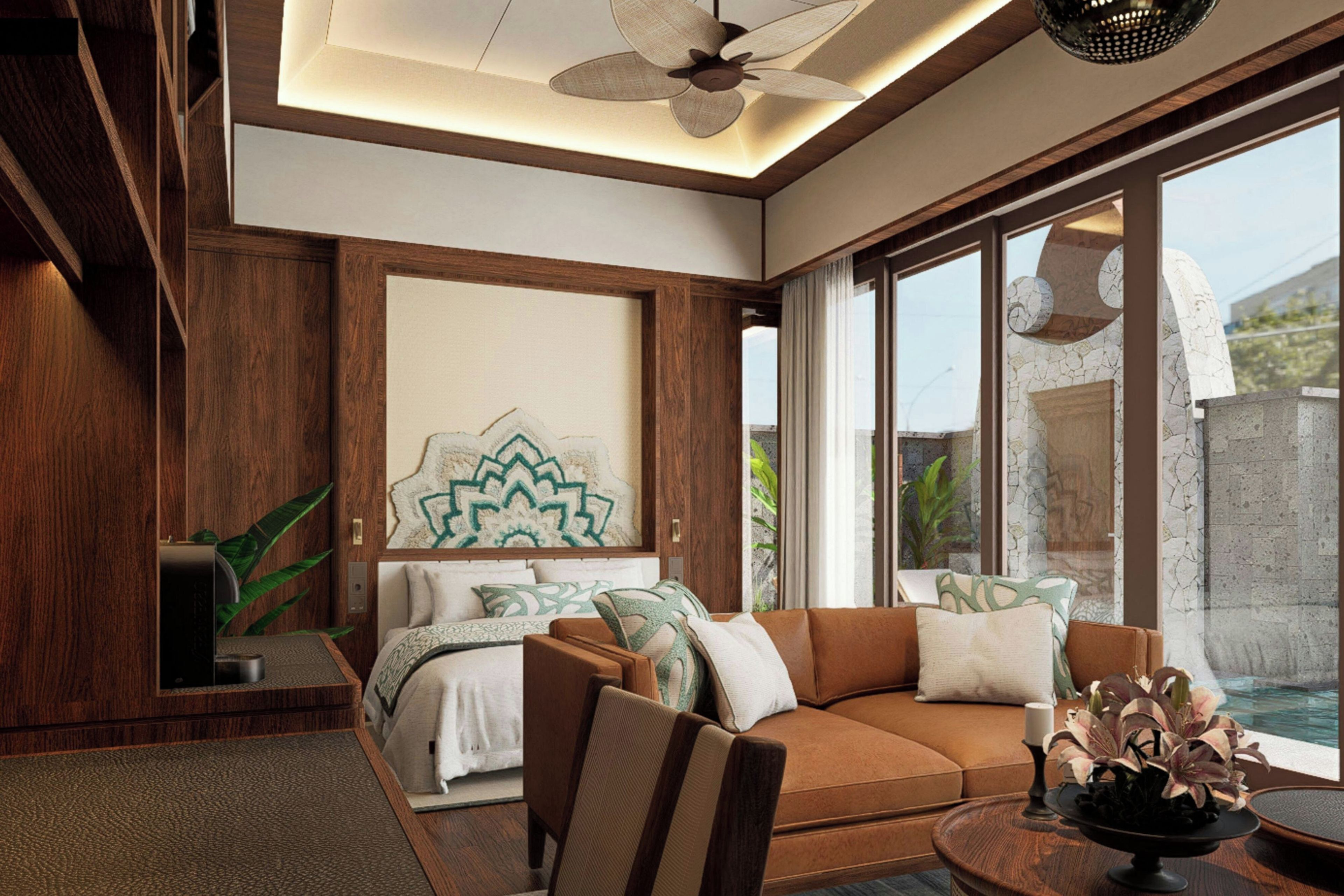 A modern bedroom with a large bed, a sofa, and a view of a pool.
