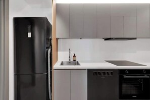 Private kitchen - Modern city center apartment with sunny balcony (Oslo)