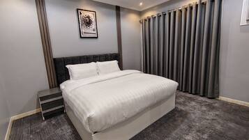 Blackout drapes, iron/ironing board, free WiFi