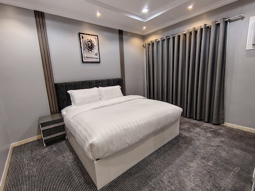 AZHAAR Suites Furnished Apartments