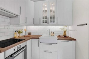 Private kitchen - Modern apartment in the heart of Oslo with balcony (Oslo)