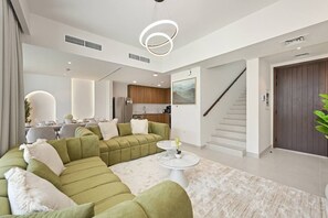 TV - Modern Luxe 4BR Oasis | Peaceful Views (Dubai)
