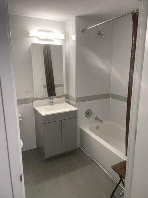 Hair dryer, towels, soap, toilet paper