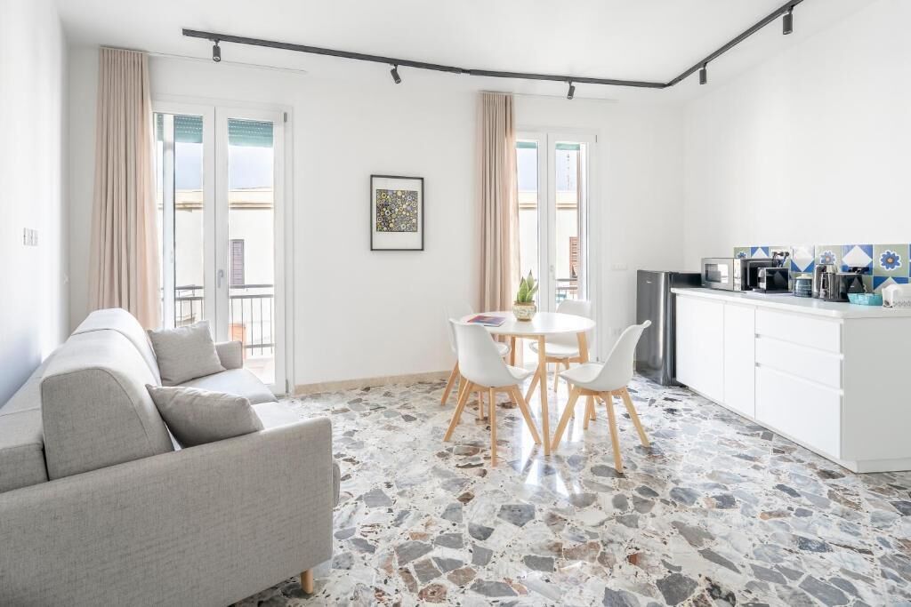 Apartamento, balcón, vistas parciales al mar | Zona de estar