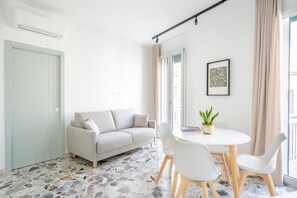 Apartment, Balcony, Partial Sea View | Living area | Flat-screen TV - Eos Serenity Suites (Syracuse)