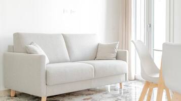 Apartment, Balkon, eingeschränkter Meerblick | Wohnbereich